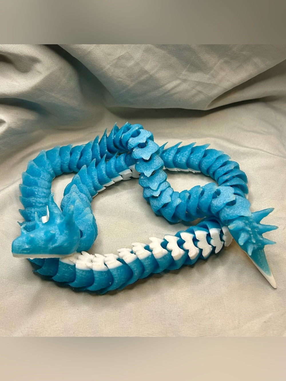 Blue and White 3D Printed Dragon Fidget Toy